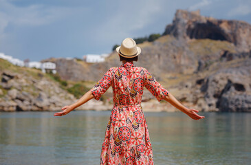 Nice Happy Female Enjoying Greek Islands. Travel to Greece, Mediterranean islands outside tourist...
