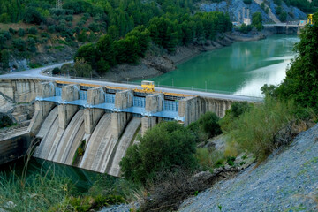dam on river, Reservoir Condo del Guadalore, hydroelectric power plant, source using energy water...