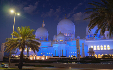 20 March 2023, Abu Dhabi, UAE: Sheikh Zayed Mosque largest mosque of UAE located in Abu Dhabi capital city of United Arab Emirates. in light of night street lamps and with illumination