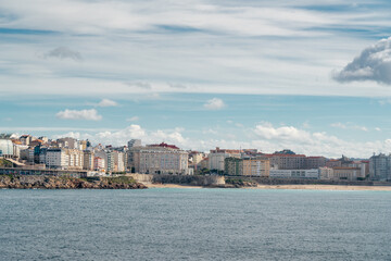 Fototapeta premium Beautiful A Coruna city. Situated in Galicia, Northwest of Spain. Travel destination. Panoramic view of the city. View of Riazor Beach and Orzán beach. Travel destination in Galicia, North of Spain.