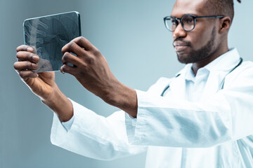 Doctor using tablet, enables bioinformatics, telemedicine
