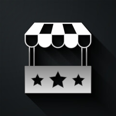 Silver Ticket box office icon isolated on black background. Ticket booth for the sale of tickets for attractions and sports. Long shadow style. Vector