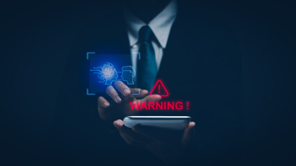 Businessman showing warning about using intelligent technology (Ai) for safety or cyber security on tablet, concept of security technology on Internet network and protection of personal information