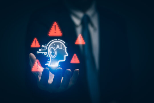 Businessman hand showing warning about use of intelligent technology (Ai), access to malicious software or cybersecurity on computers. concept security technology and protection of information