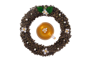 Mockup of dried tea leaves and fresh jasmine flowers shaped in round Frame whith tea cup in center isolated on transparent background png
