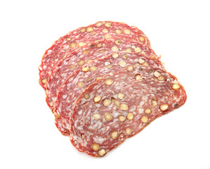 Sliced dry sausage with hazelnut