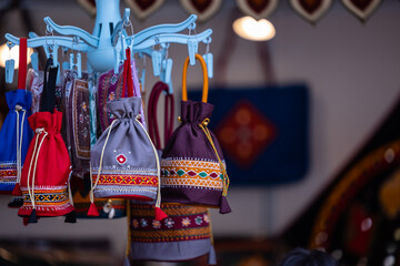 Interior decoration, Handmade colorful hanging ladies purse items for decoration display at shop.