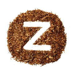 Letter Z made of cigarettes dried smoking tobacco on white background