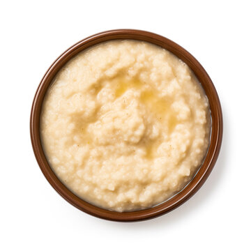Grits Porridge cooked top view isolated on white background 