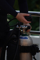 Obraz premium Preparing Scuba Diving Equipment for the Dive
