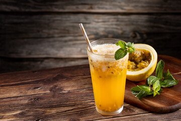 Refreshing passion fruit drink with mint and vodka.
