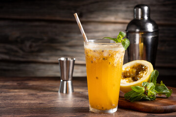 Refreshing passion fruit drink with mint and vodka.