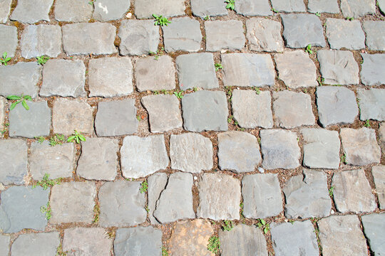 Grey cobble stone street pattern background