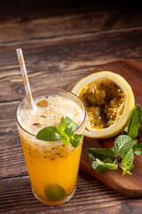 Refreshing passion fruit drink with mint and vodka.