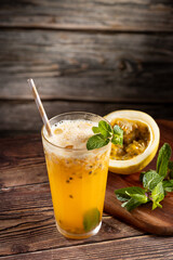 Refreshing passion fruit drink with mint and vodka.