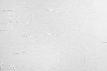 Paper texture with folds, close-up, abstract background.