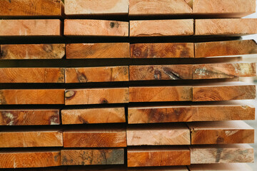 Stacks of lumber being stored in a warehouse