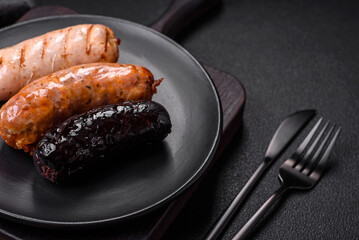 Delicious juicy sausages of several varieties grilled with salt, spices and herbs