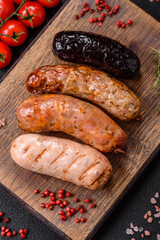 Delicious juicy sausages of several varieties grilled with salt, spices and herbs