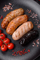 Delicious juicy sausages of several varieties grilled with salt, spices and herbs