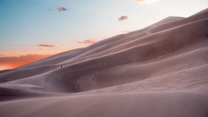 desert with cloudy sky during sunset