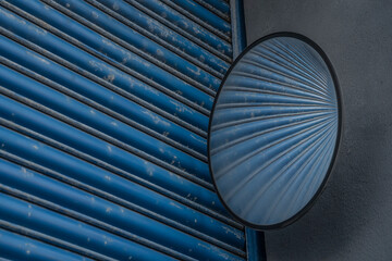 weathered garage door with mirror