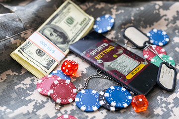 game chips with a column of bucks of dollars laid out after the game. Poker concept