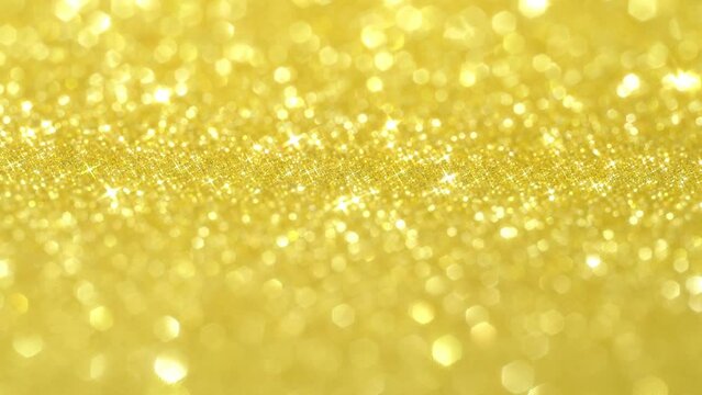 Glitter, golden background, camera motion