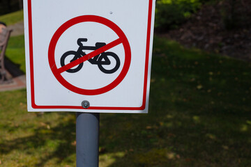 No bicycles warning sign. Dangerous descent in the park