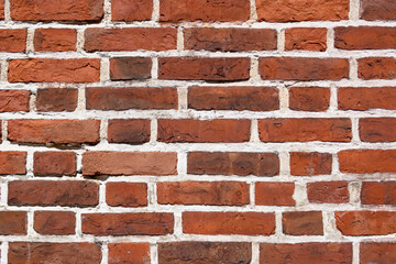 red brick wall in the historical part of the old city in europe as a background 43