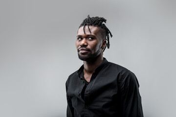 Handsome man glances right, cautious