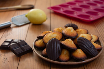 Homemade madeleine and chocolate
