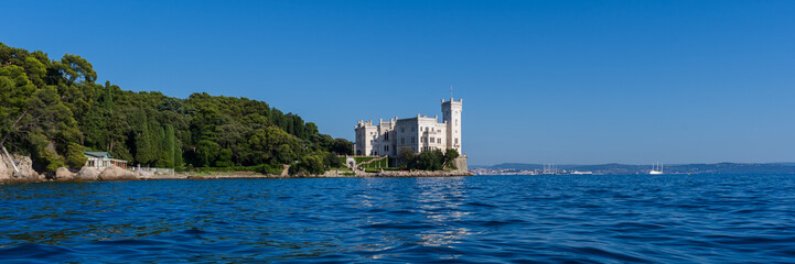 Fototapeta na wymiar white castle by the sea. banner format