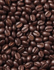 Fototapeta premium Pile of roasted coffee beans as background, top view