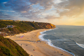 Fototapeta na wymiar Beautiful beach with cliffs and a littile river. Beach of Paredes Vitoria - Nazare - Portugal