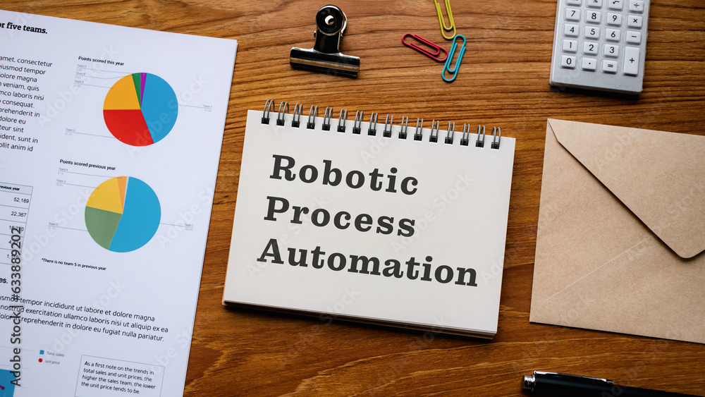 Poster there is notebook with the word robotic process automation. it is as an eye-catching image.