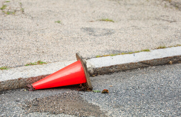 construction cones line streets, embodying urban evolution, progress, caution, and temporary...