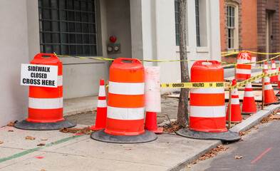 construction cones line streets, embodying urban evolution, progress, caution, and temporary transformation