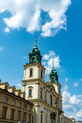 Fototapeta na wymiar Shot of the copper roof and bell towers at the Holy Cross Church in Warsaw