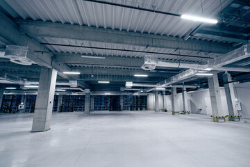 Empty industrial hall with ceiling ventilation system