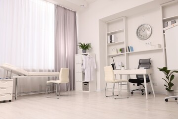 Modern medical office interior with doctor's workplace