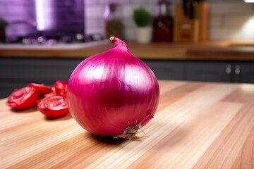 Red onion on a wooden kitchen counter. Naturally lit surroundings in boho style.