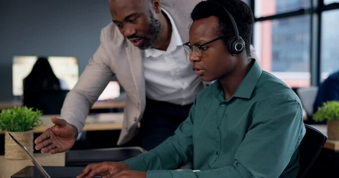 Call center, coaching and business people on computer in technical support or advice, helping and IT solution. African manager training consultant man with information technology questions on laptop