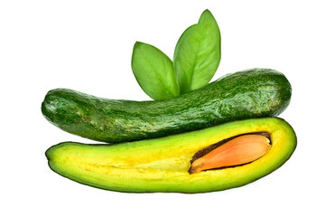 Avocado.Green fruit.Fresh halves.Exposed flesh and seed inside.Contains many vitamins.Put on a white background.
