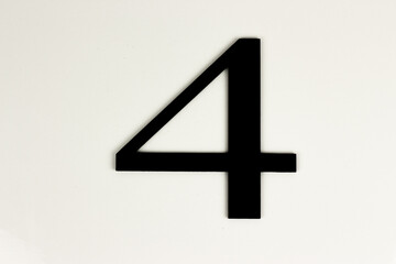 Obraz premium White background with number 4 - Black number on white background