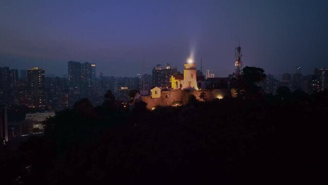 Guia Lighthouse On The Hill Of Night Macau, China, Aerial View