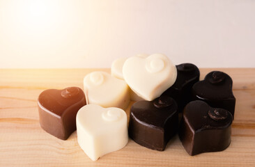 Heart chocolate on wood