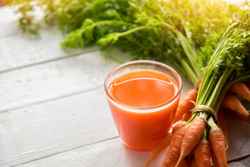 Glasses of baby carrot juice