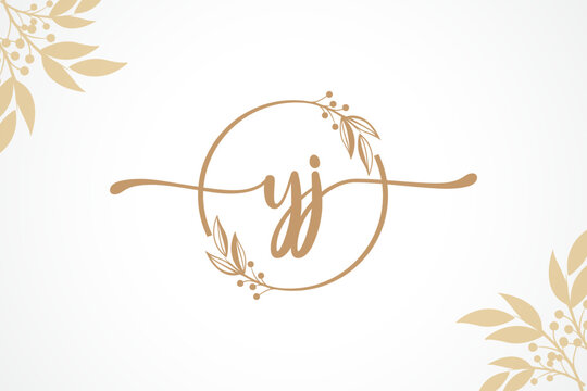 luxury gold signature initial yj logo design isolated leaf and flower