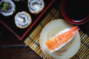 Sushi Set nigiri shrimp aon wood,top view,